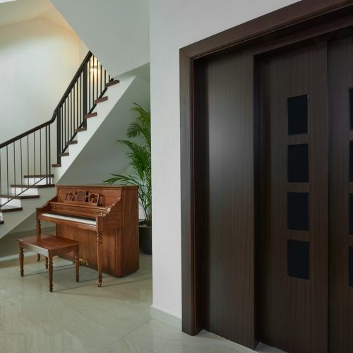 brown wooden bench beside brown wooden door